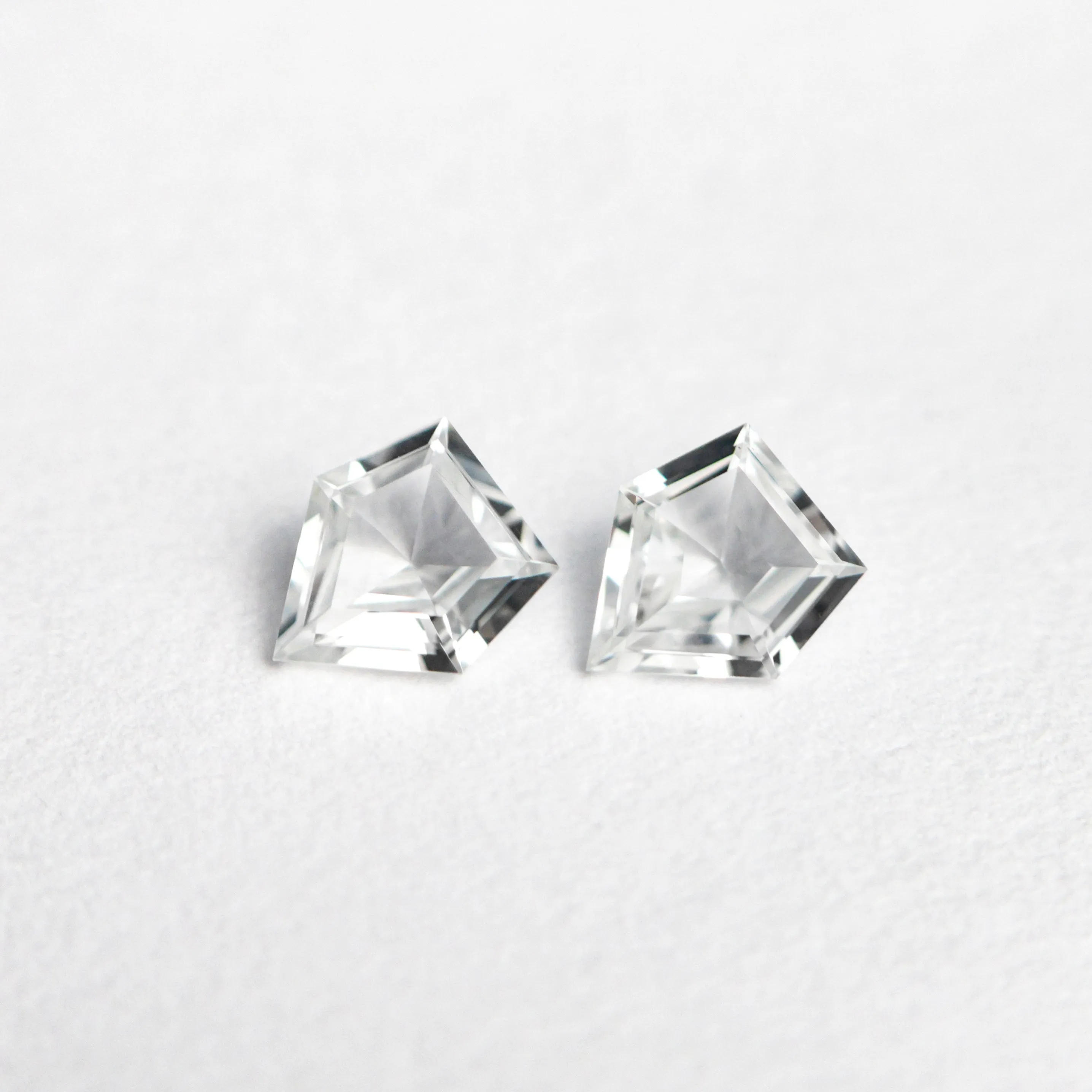 0.31cttw 2pc 4.01x3.51x1.58mm 4.00x3.49x1.54mm Shield Step Cut Sapphire Matching Pair 22794-01