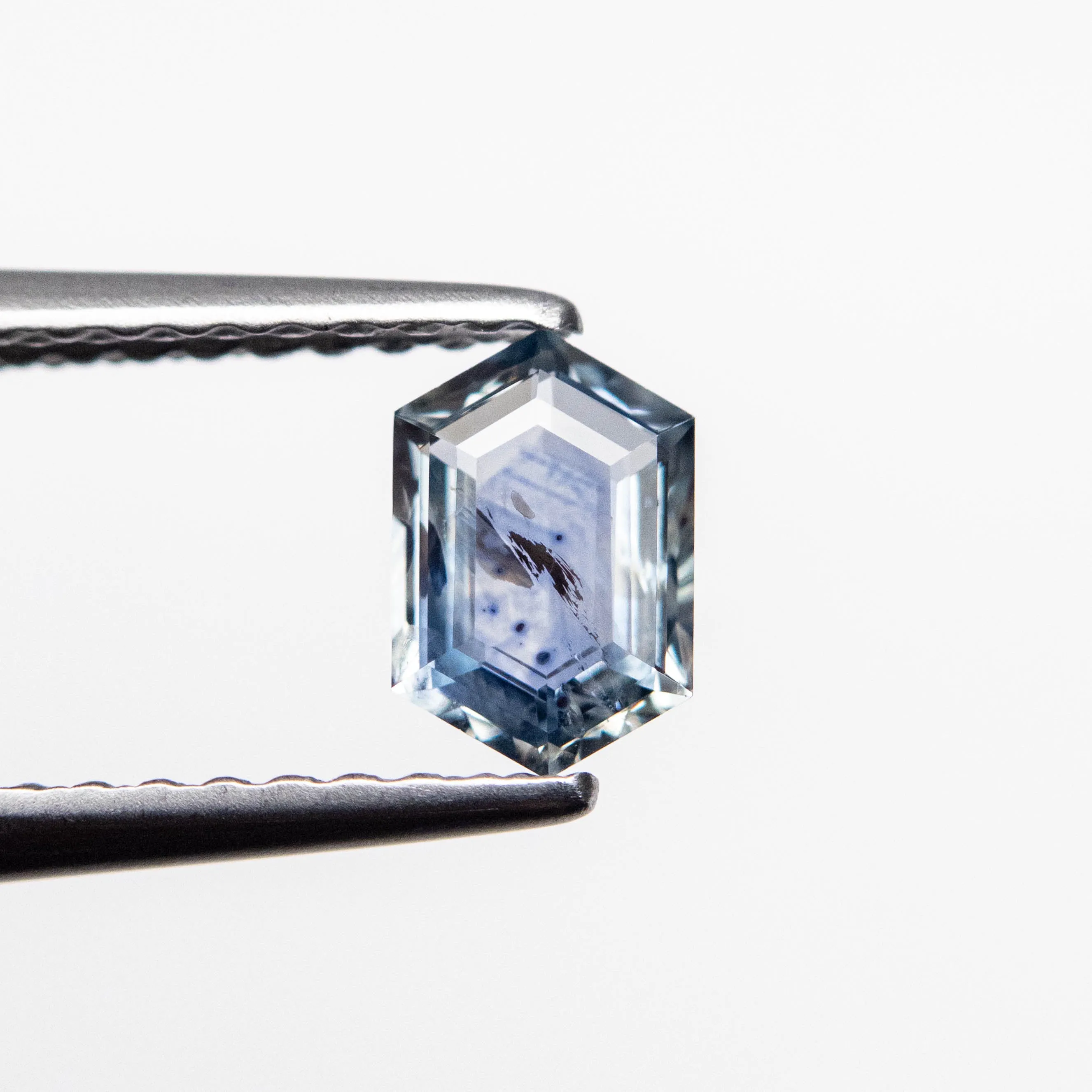 0.57ct 6.08x4.05x2.12mm Hexagon Step Cut Sapphire 23088-12